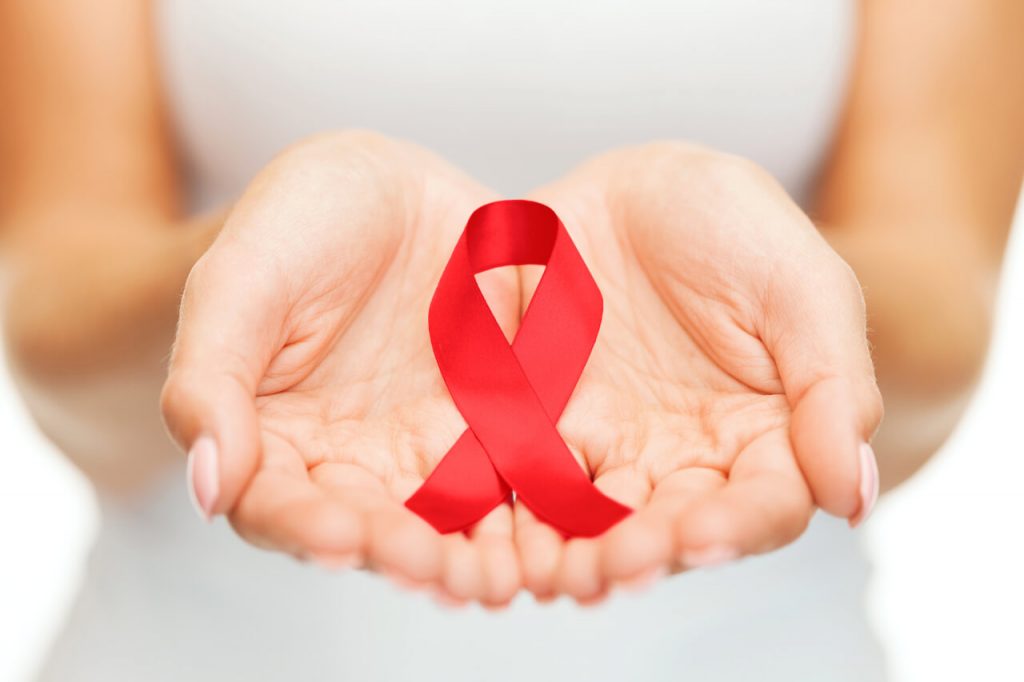 Červená stužka ako symbol povedomia o AIDS