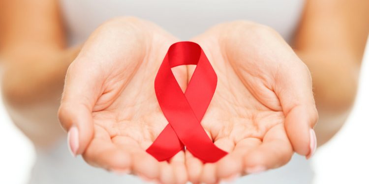 Červená stužka ako symbol povedomia o AIDS
